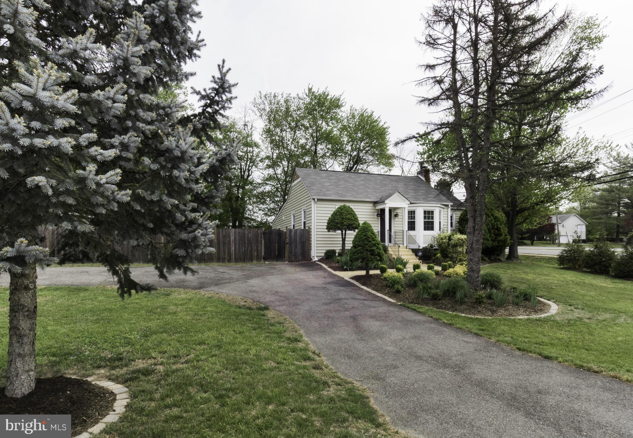 6600 Pine Road Alexandria, VA 22312 - Photo 28 of 28 a front view of a house with garden