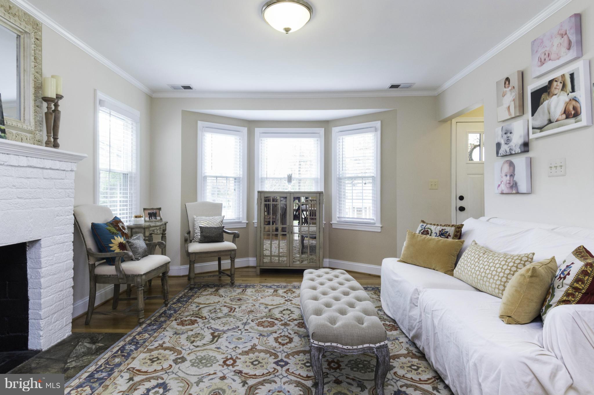 6600 Pine Road Alexandria, VA 22312 - Photo 4 of 28 a living room with furniture and a large window