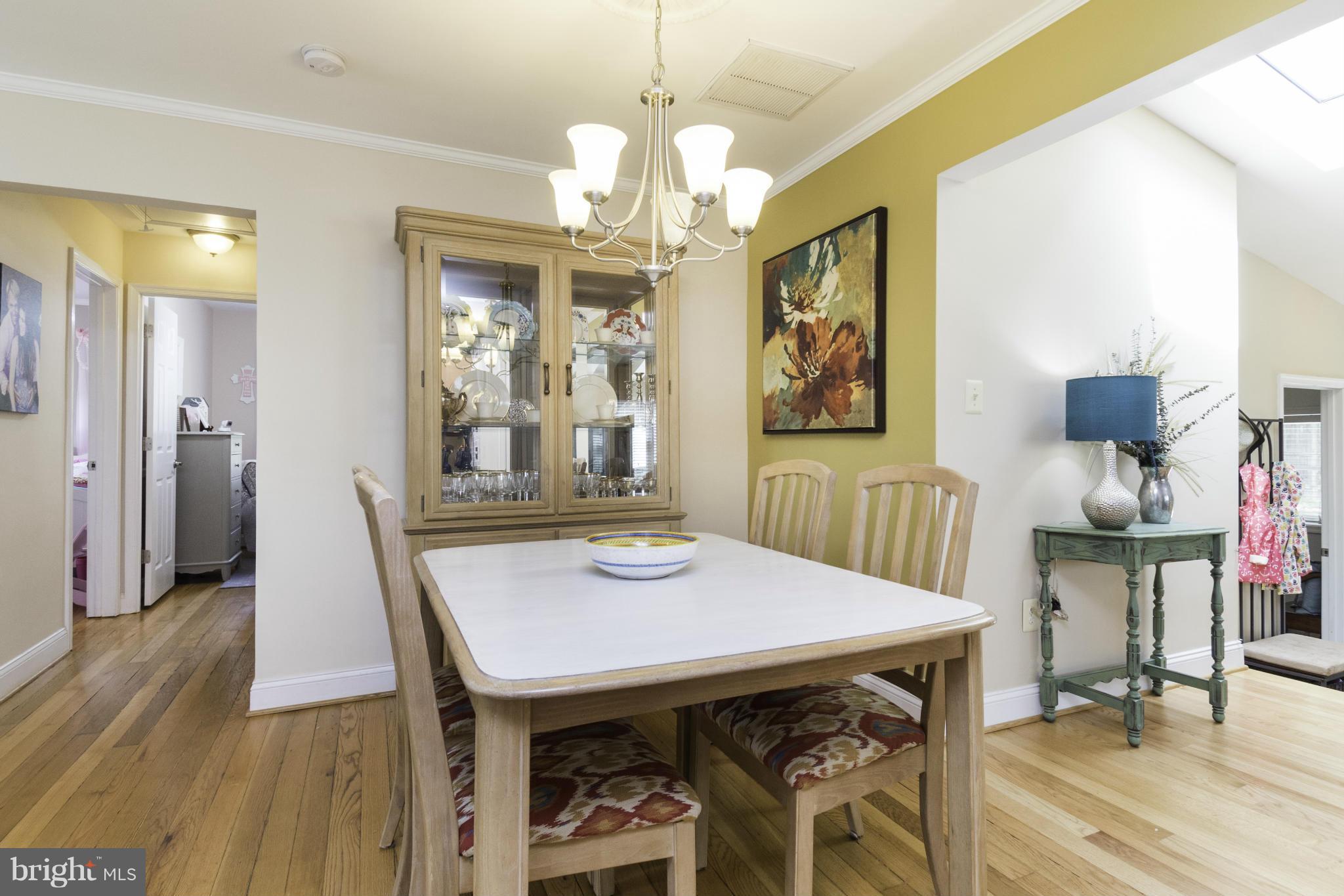 6600 Pine Road Alexandria, VA 22312 - Photo 5 of 28 a view of a dining room with furniture window and wooden floor