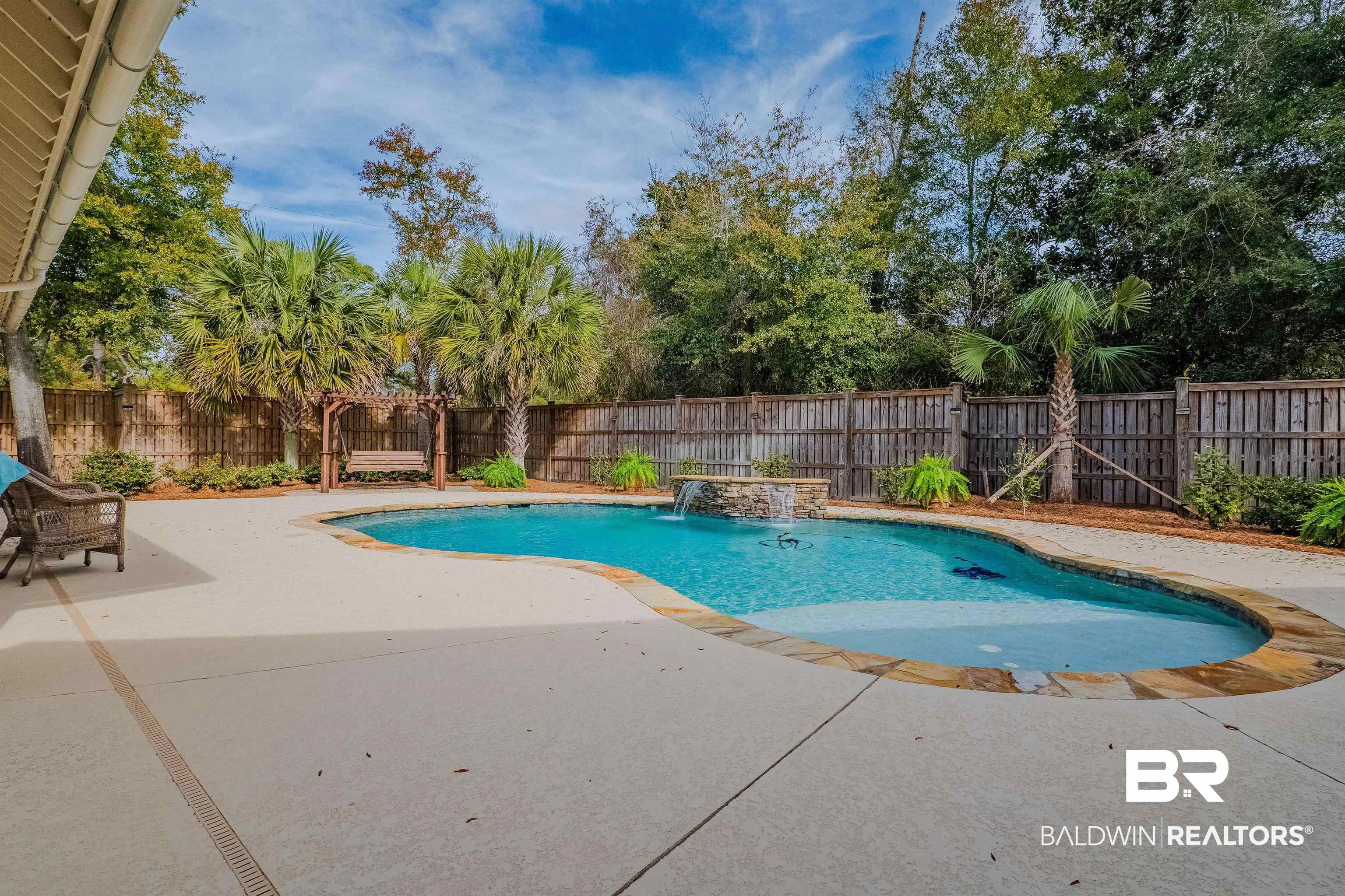 708 Manning Place Fairhope, AL 36532 - Photo 44 of 58 View of swimming pool with a patio area and pool water feature