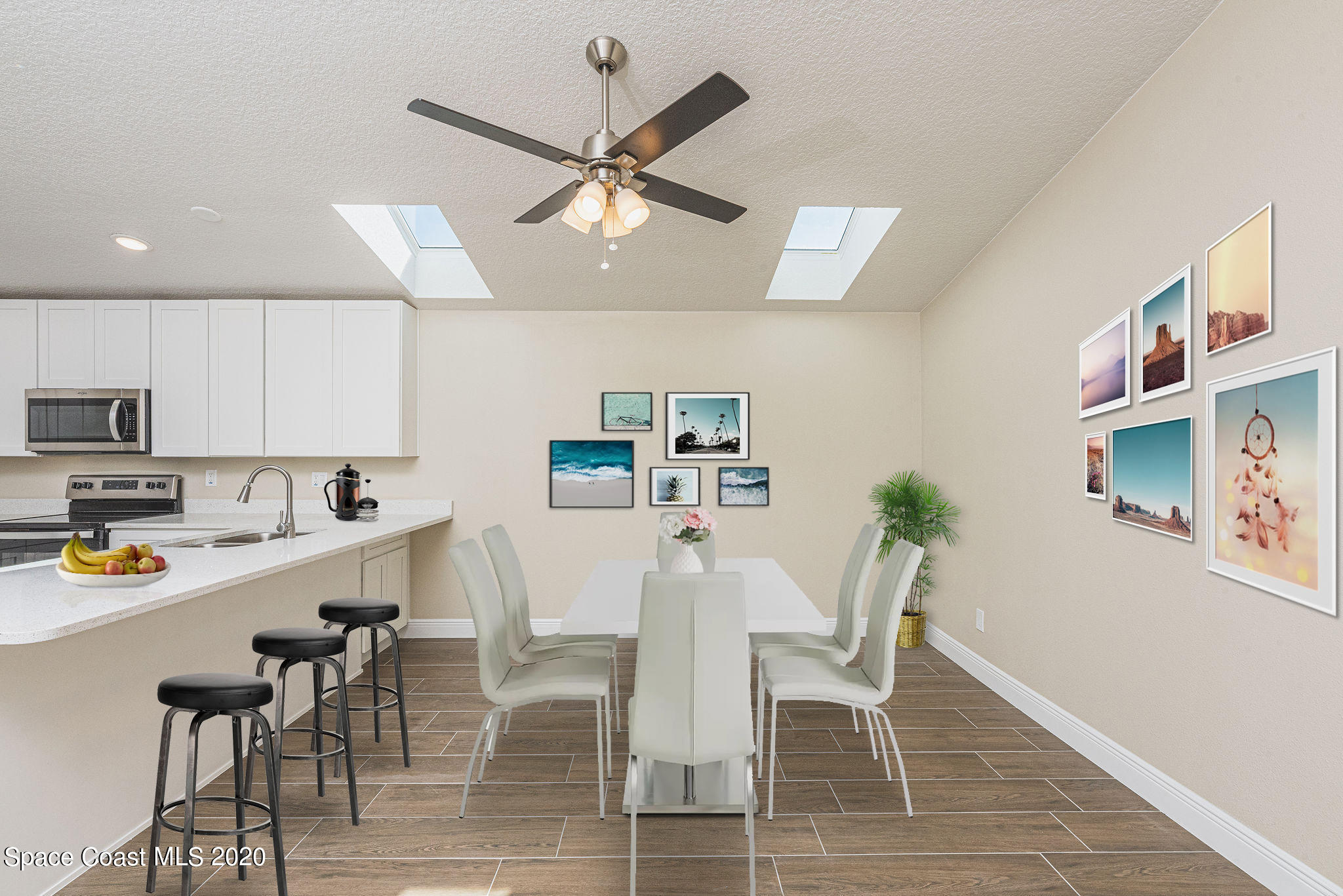 336 Myrtlewood Road Melbourne, FL 32940 - Photo 27 of 72 a view of a dining room with furniture and wooden floor