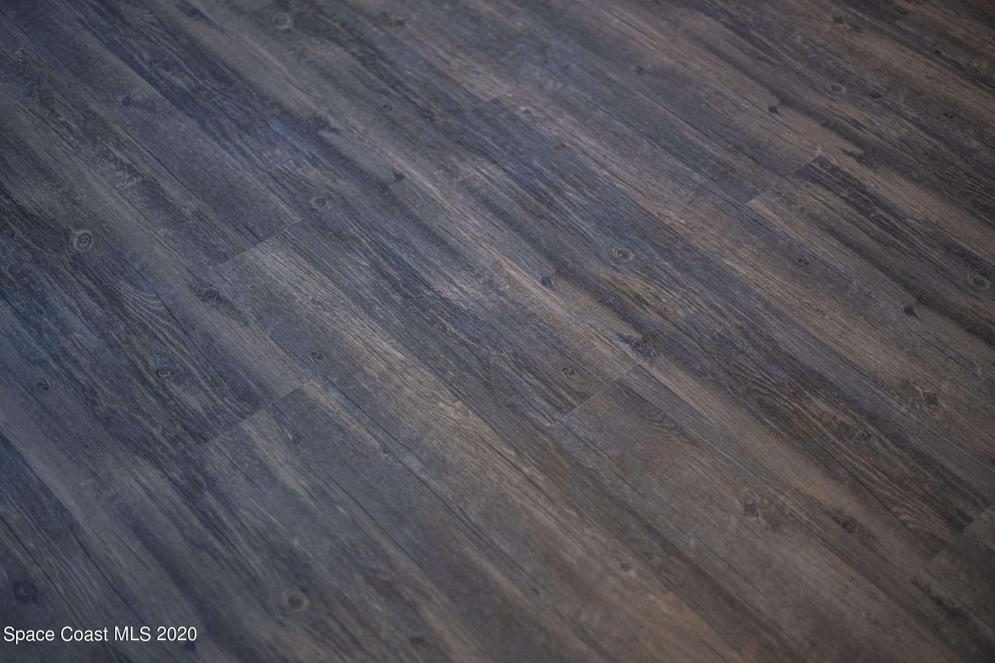 336 Myrtlewood Road Melbourne, FL 32940 - Photo 38 of 72 a view of a wooden floor
