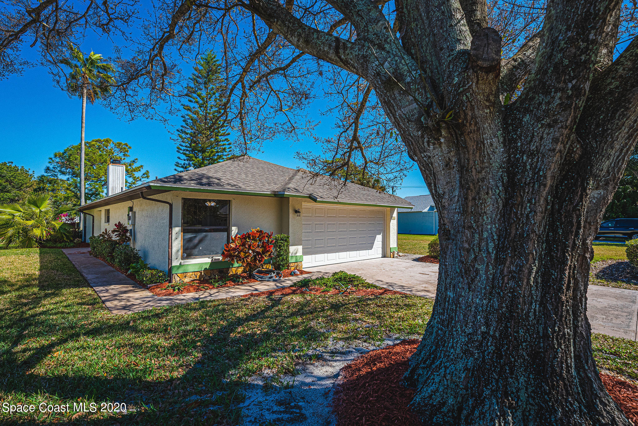 336 Myrtlewood Road Melbourne, FL 32940 - Photo 5 of 72 a view of a house with a yard