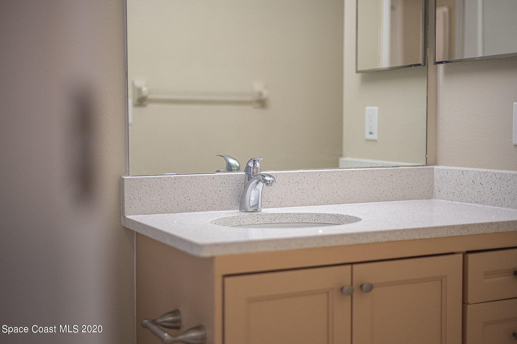 336 Myrtlewood Road Melbourne, FL 32940 - Photo 45 of 72 a bathroom with a sink and a vanity