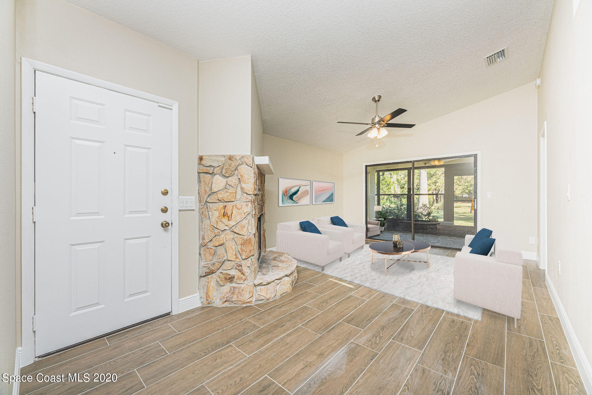 336 Myrtlewood Road Melbourne, FL 32940 - Photo 6 of 72 a living room with furniture window and wooden floor