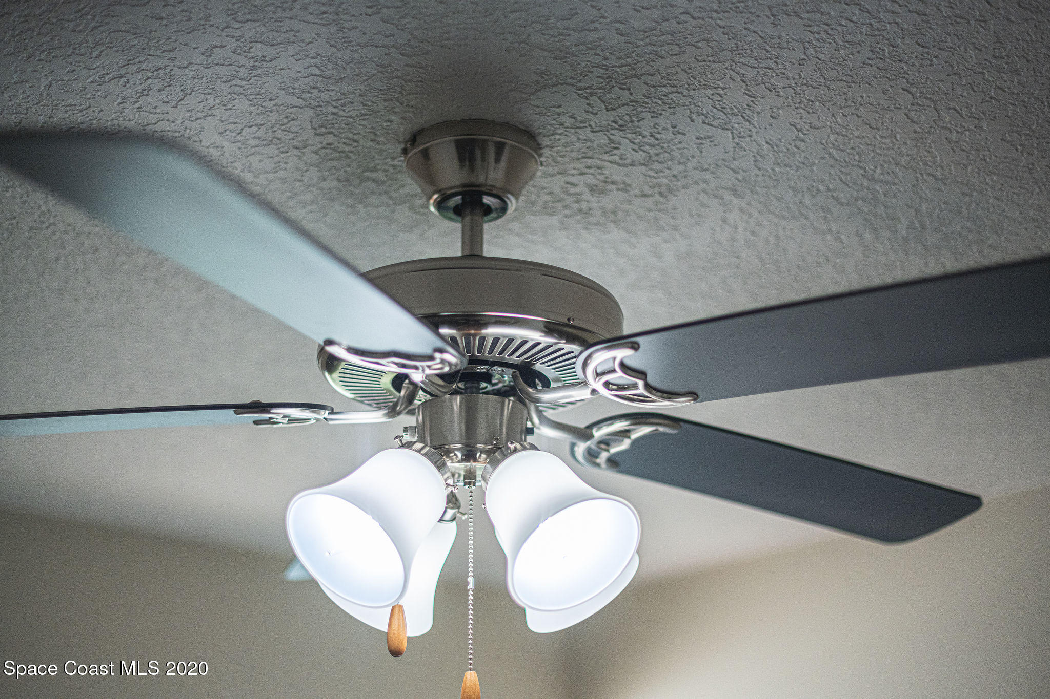 336 Myrtlewood Road Melbourne, FL 32940 - Photo 52 of 72 a close view of light fixtures and windows