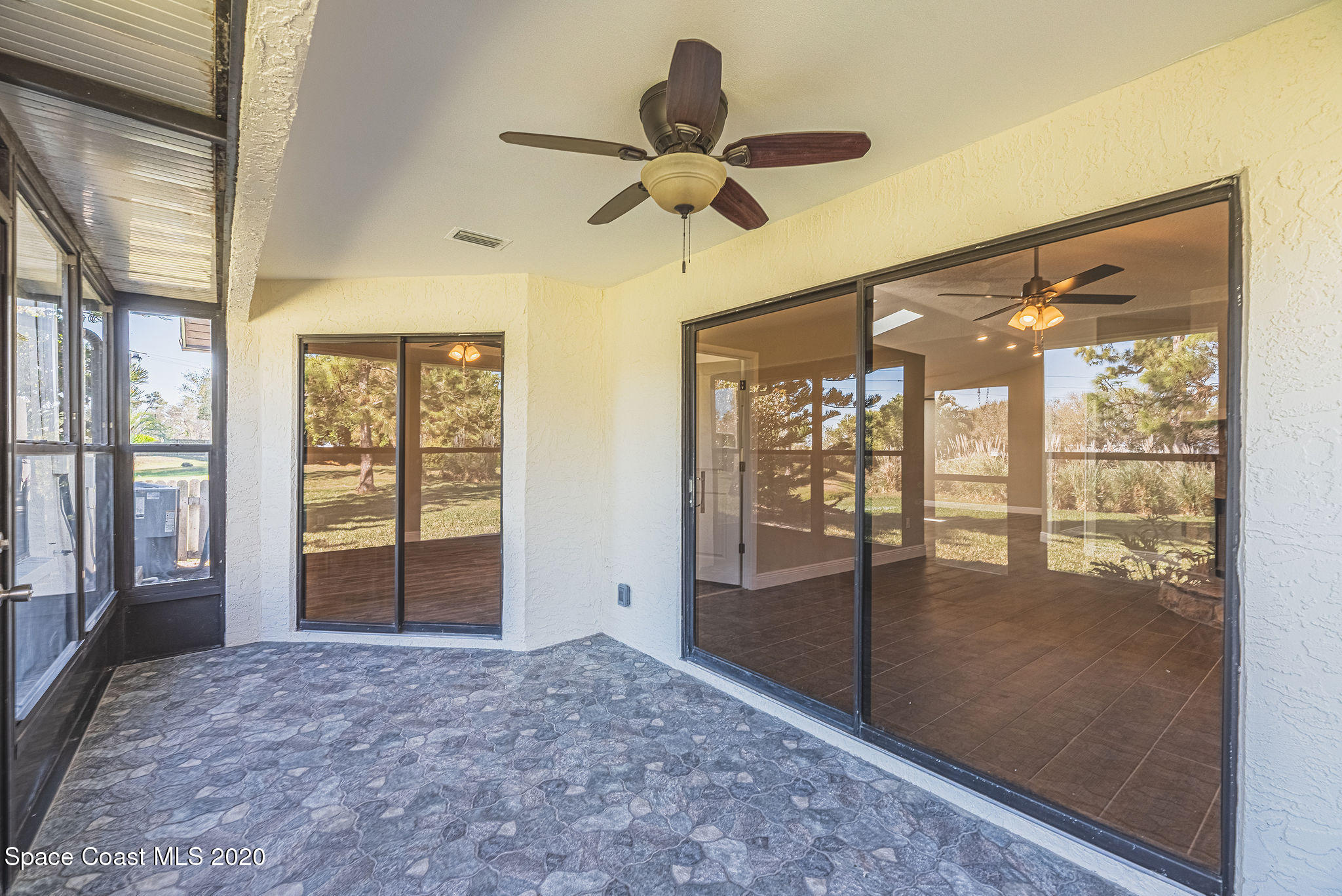 336 Myrtlewood Road Melbourne, FL 32940 - Photo 56 of 72 a view of an empty room with a window