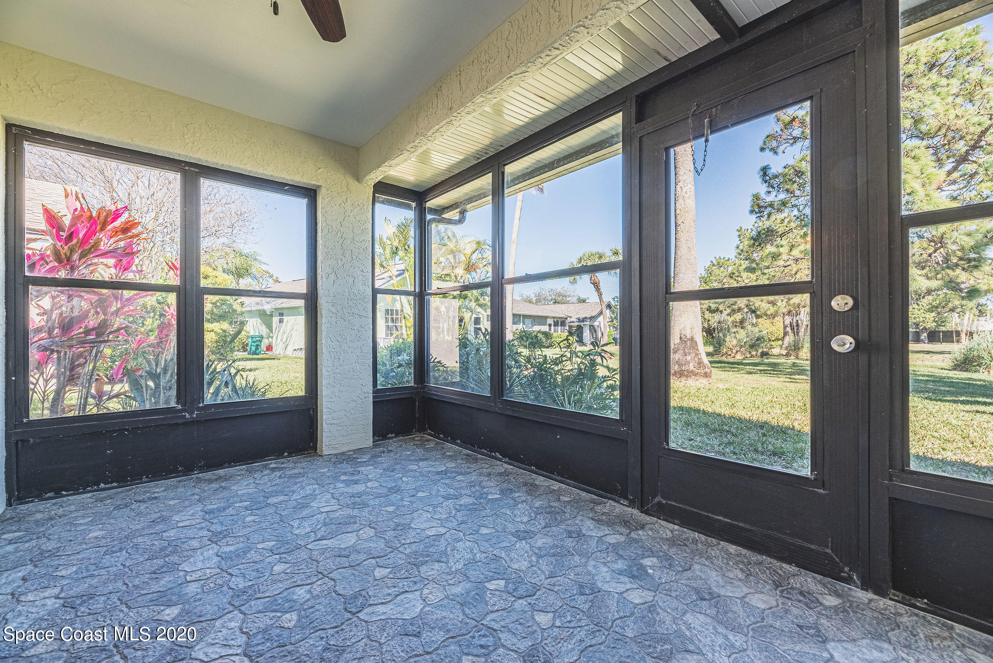 336 Myrtlewood Road Melbourne, FL 32940 - Photo 57 of 72 a view of an empty room with a large window