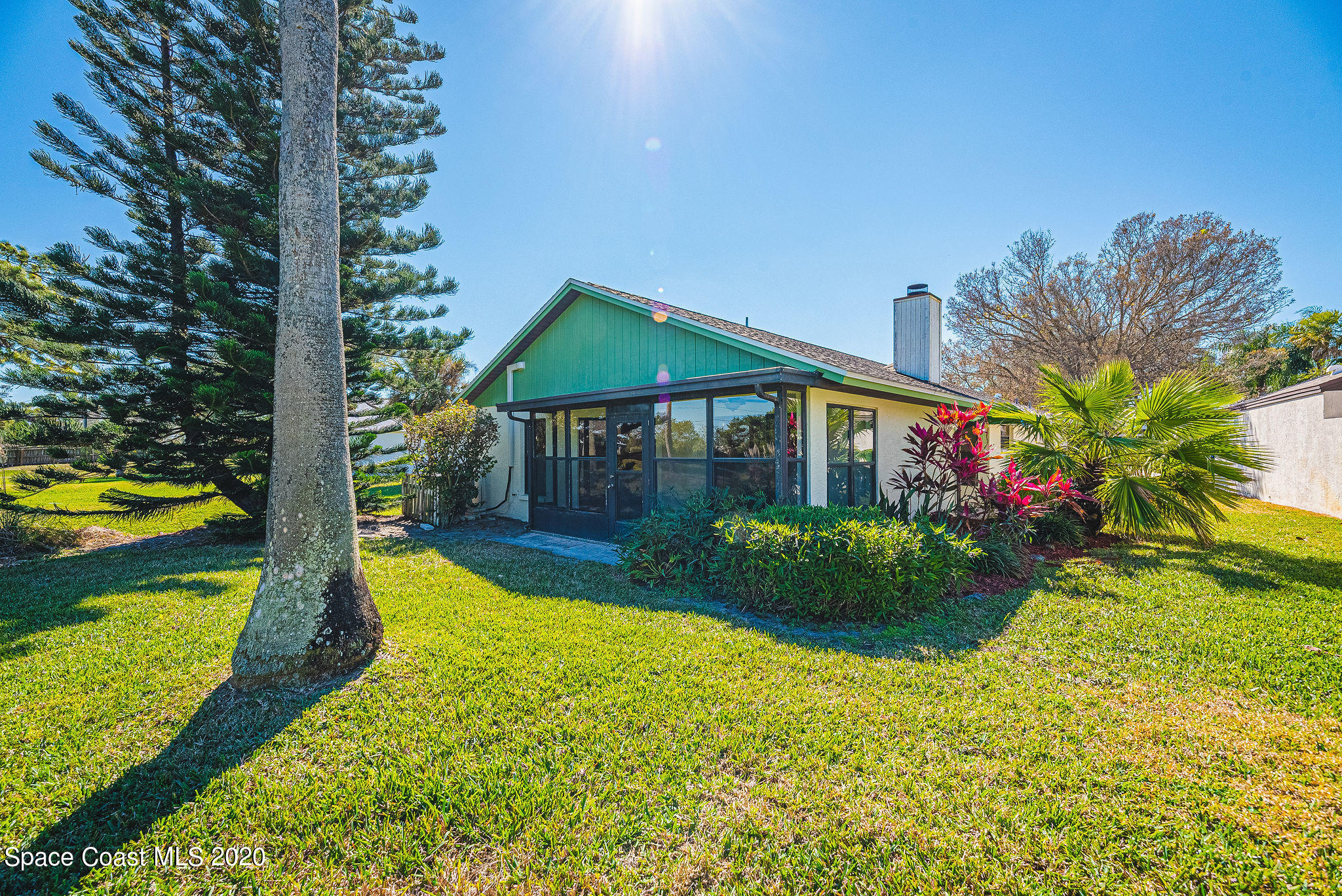 336 Myrtlewood Road Melbourne, FL 32940 - Photo 58 of 72 a view of a house with swimming pool and garden