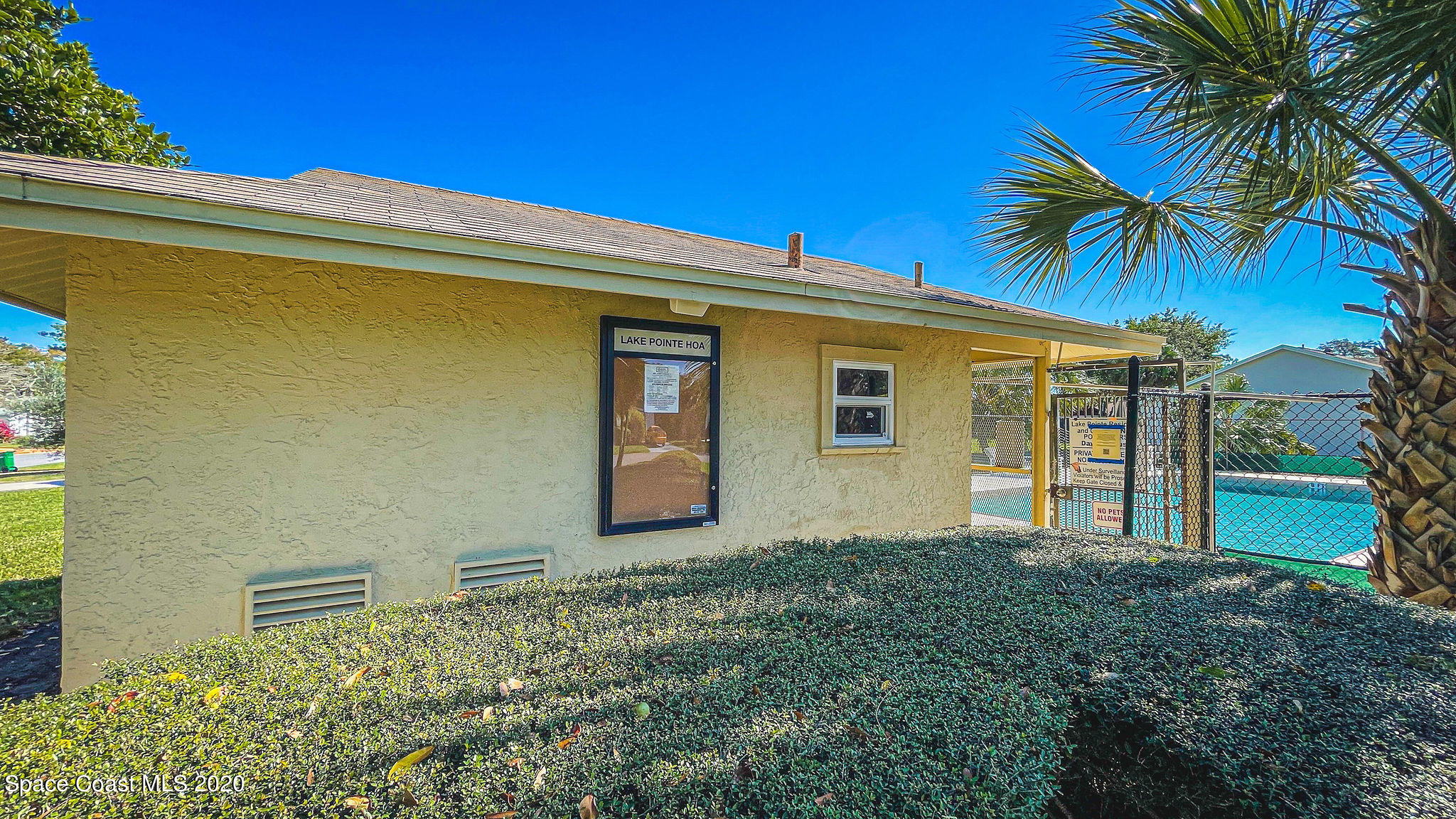 336 Myrtlewood Road Melbourne, FL 32940 - Photo 63 of 72 a front view of a house with a garden