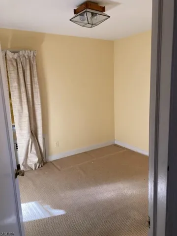an empty room with a door