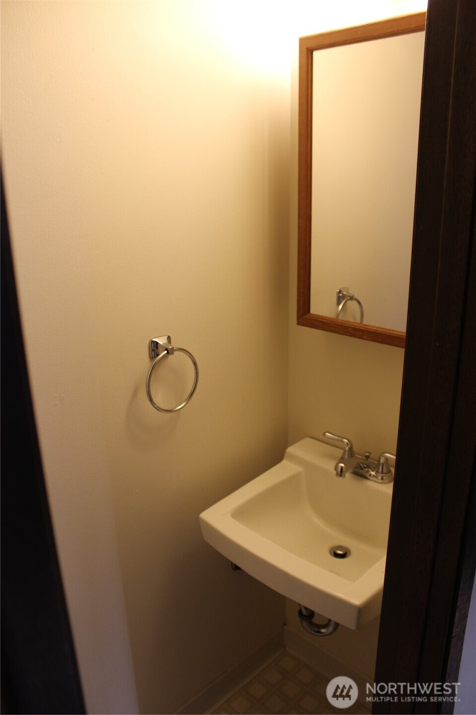 419 156th Place Northeast Bellevue, WA 98008 - Photo 17 of 22 a bathroom with a sink and mirror