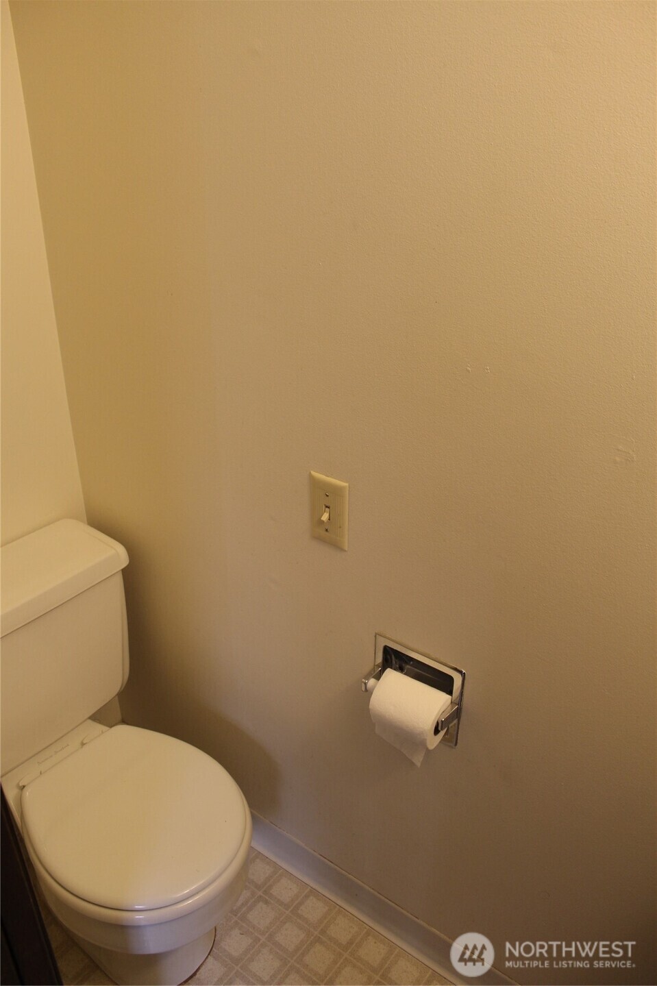 419 156th Place Northeast Bellevue, WA 98008 - Photo 18 of 22 a white toilet sitting next to a white wall