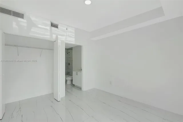 a view of a city with tall buildings