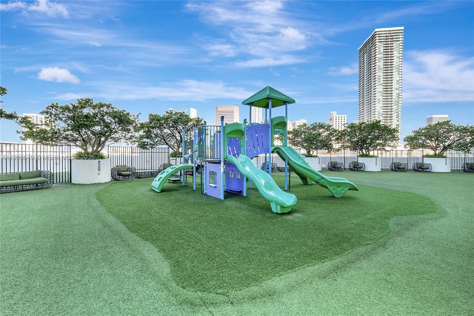 90 Southwest 3rd Street, Unit 1602 Miami, FL 33130 - Photo 66 of 81 a view of a garden with a slide