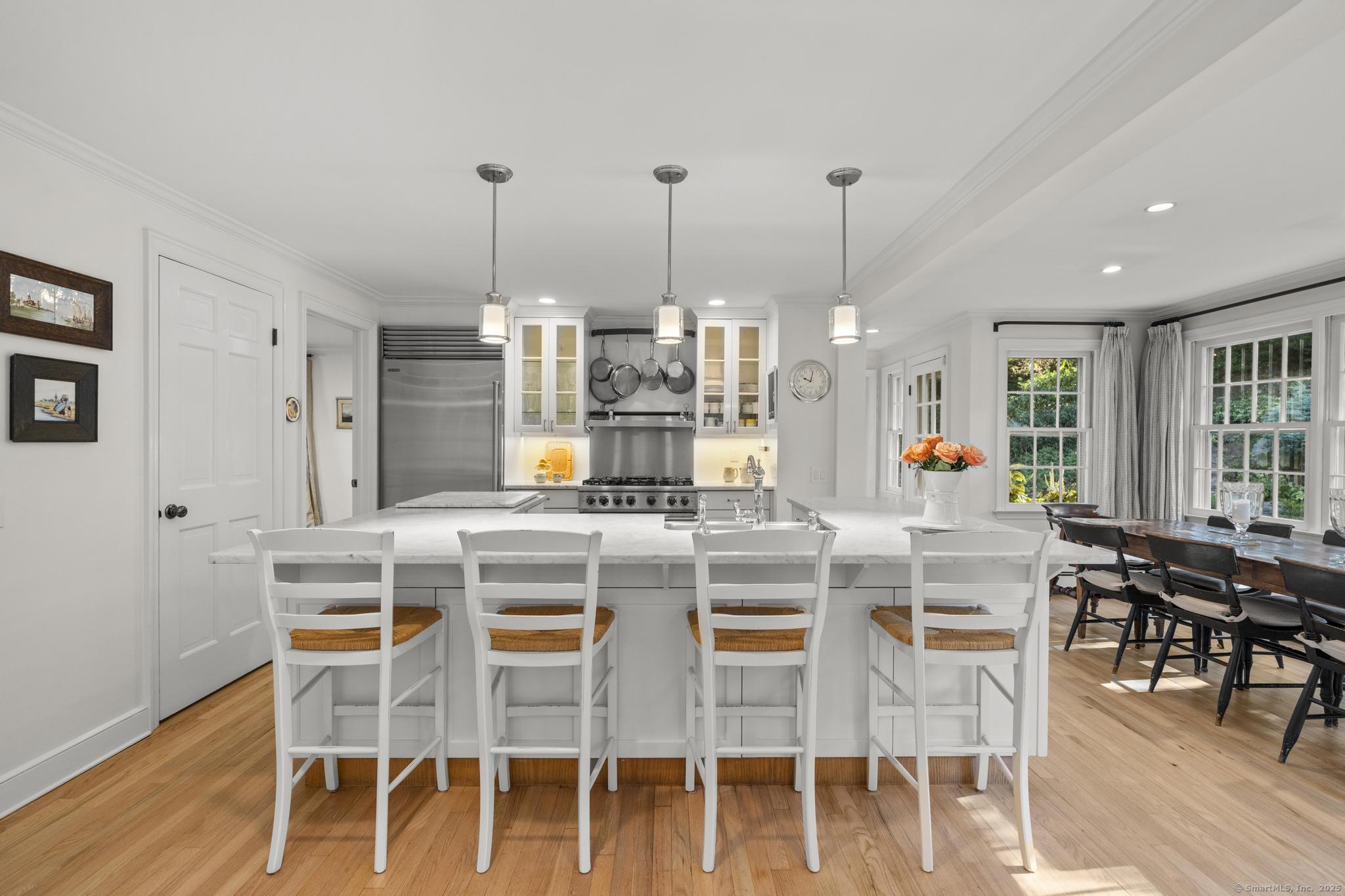 1165 Stillson Road Fairfield, CT 06824 - Photo 15 of 40 a view of a dining room with furniture