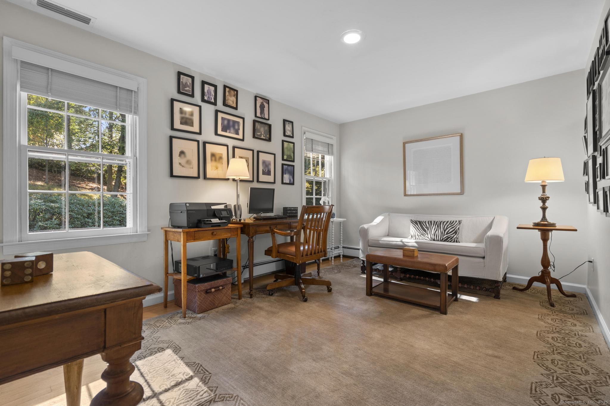 1165 Stillson Road Fairfield, CT 06824 - Photo 30 of 40 a livingroom with workspace and a window