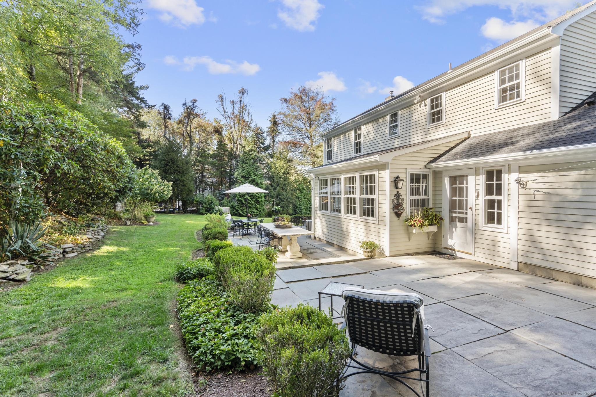 1165 Stillson Road Fairfield, CT 06824 - Photo 37 of 40 a house view with a sitting space and garden space
