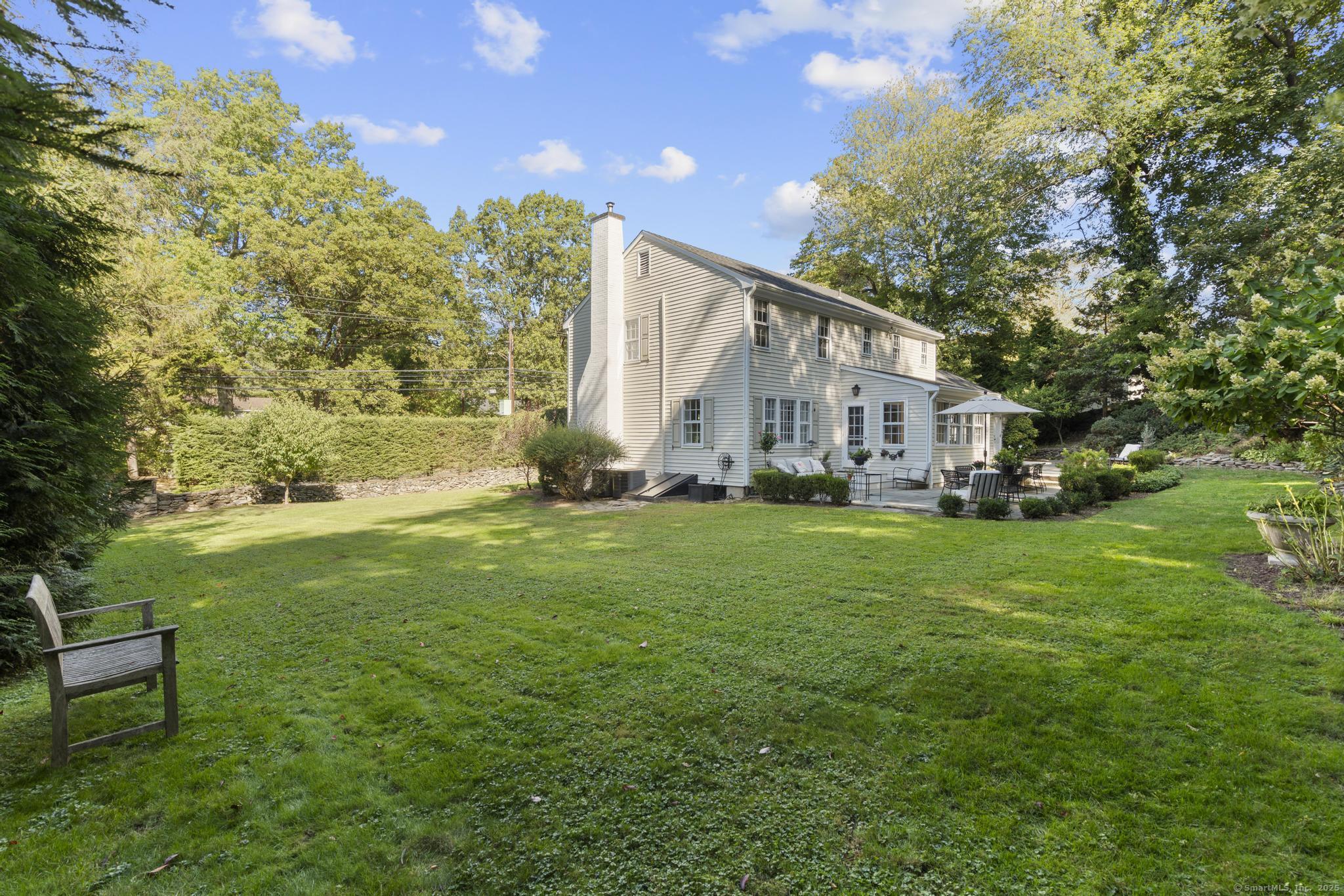 1165 Stillson Road Fairfield, CT 06824 - Photo 40 of 40 a view of house with backyard