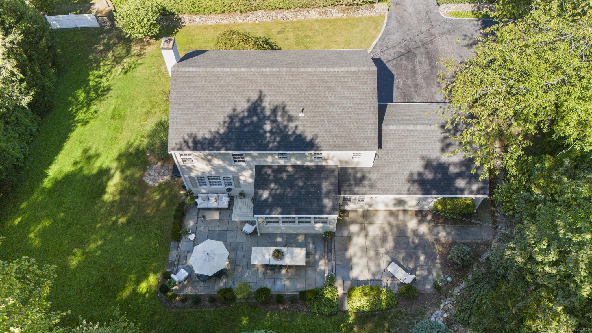 1165 Stillson Road Fairfield, CT 06824 - Photo 5 of 40 an aerial view of a house with outdoor space pool seating area and yard