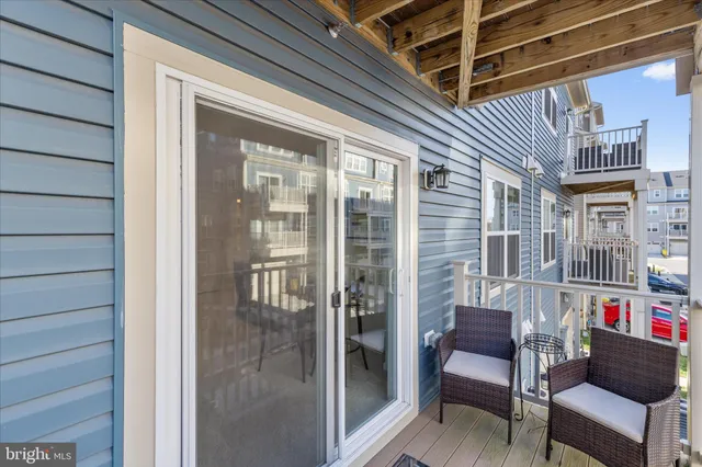 a front view of a building with parking space