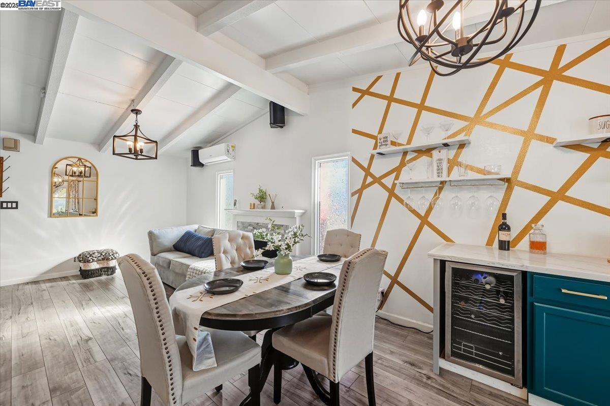 1481 Rieger Avenue Hayward, CA 94544 - Photo 13 of 53 a view of a dining room with furniture and wooden floor