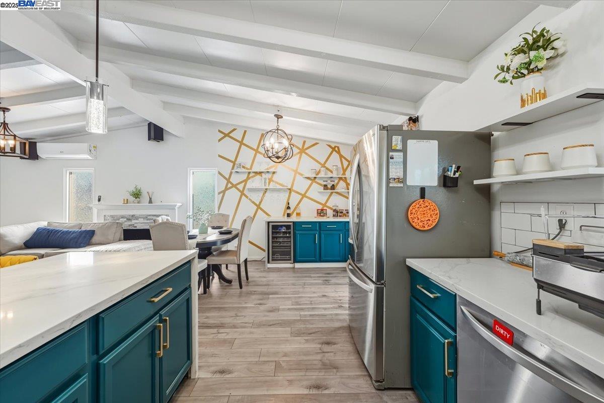 1481 Rieger Avenue Hayward, CA 94544 - Photo 23 of 53 a kitchen with a sink and a stove