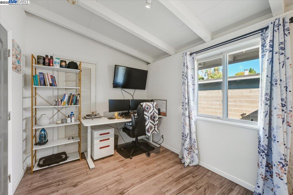 1481 Rieger Avenue Hayward, CA 94544 - Photo 29 of 53 a view of a workspace with furniture and a window