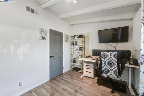 a view of walk in closet with window