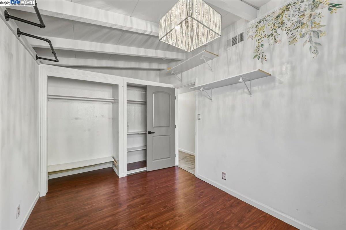 1481 Rieger Avenue Hayward, CA 94544 - Photo 33 of 53 a view of an empty room with wooden floor