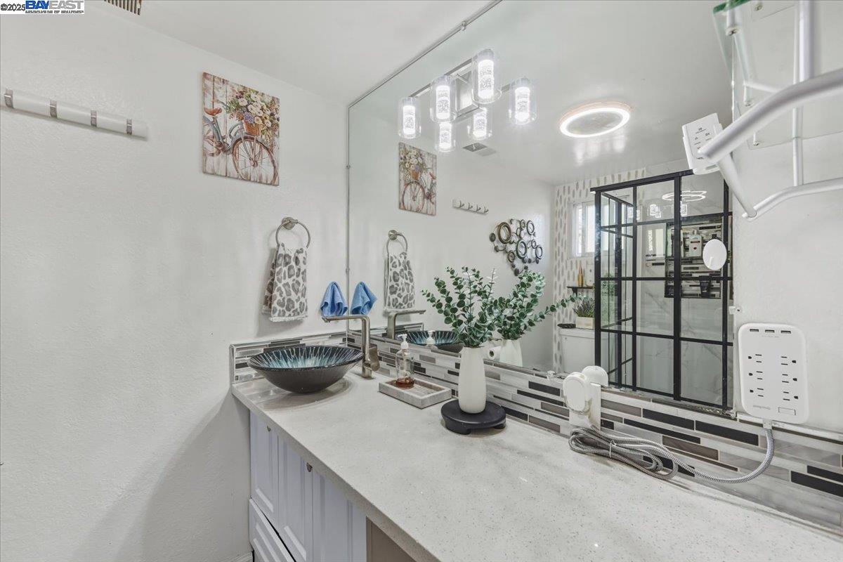 1481 Rieger Avenue Hayward, CA 94544 - Photo 39 of 53 a kitchen with a sink and cabinets