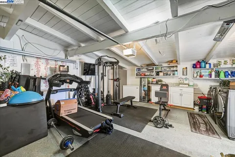 a storage room with lots of wooden furniture