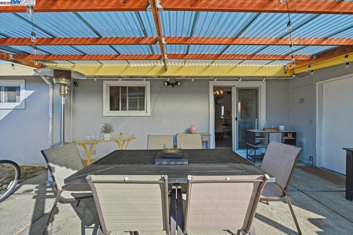 1481 Rieger Avenue Hayward, CA 94544 - Photo 50 of 53 a kitchen with a table chairs and a dining table