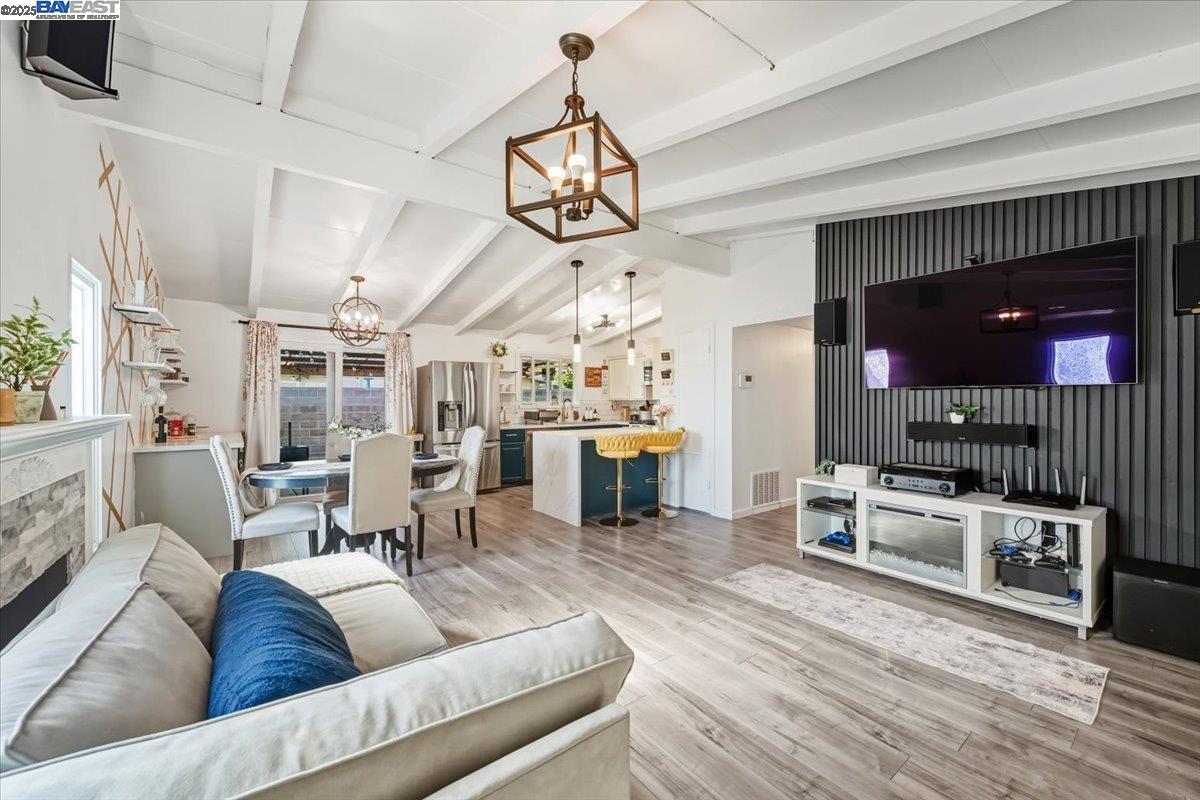 1481 Rieger Avenue Hayward, CA 94544 - Photo 6 of 53 a living room with furniture and a flat screen tv