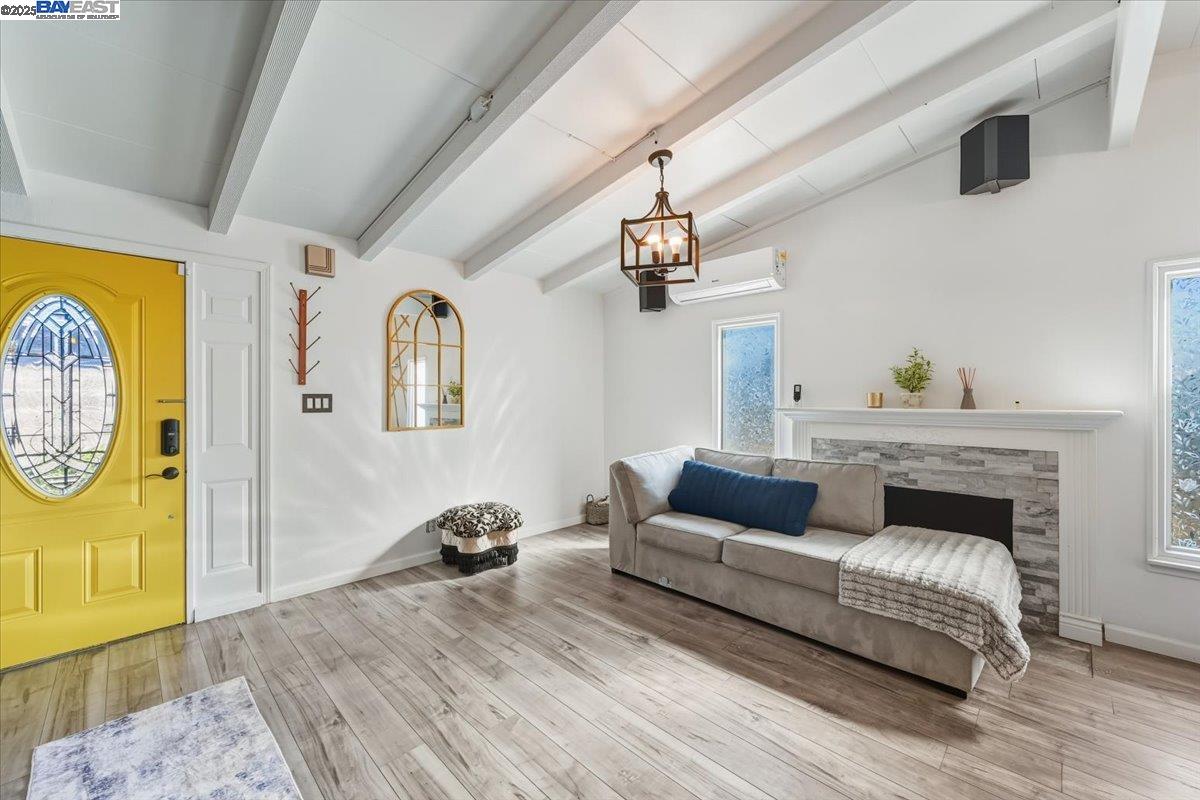 1481 Rieger Avenue Hayward, CA 94544 - Photo 8 of 53 a living room with furniture and a fireplace