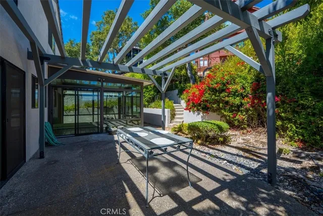 an aerial view of a city and ocean view