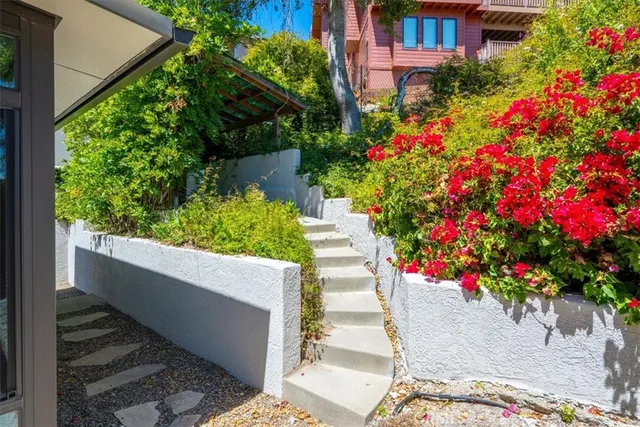 an aerial view of a city with ocean view