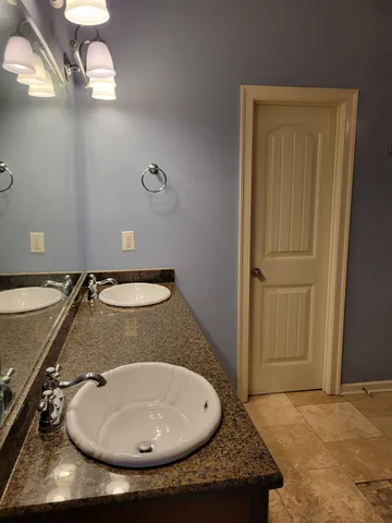 a view of a backyard of the house