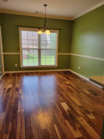 a bathroom with a toilet a sink and bathtub