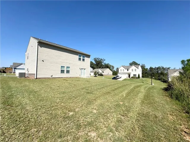 a view of back yard of the house
