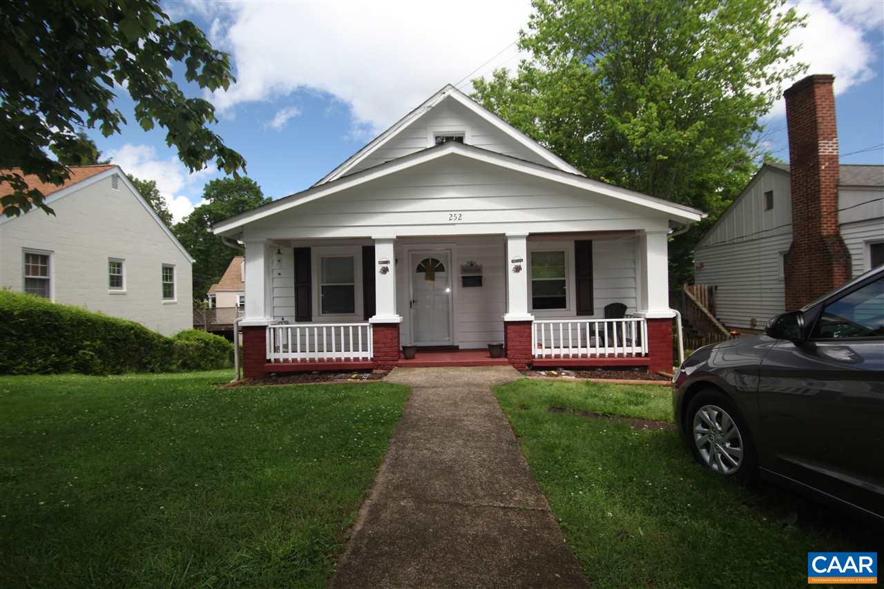 252 Shamrock Road Charlottesville, VA 22903 - Photo 1 of 18 a view of a house with a yard porch and furniture