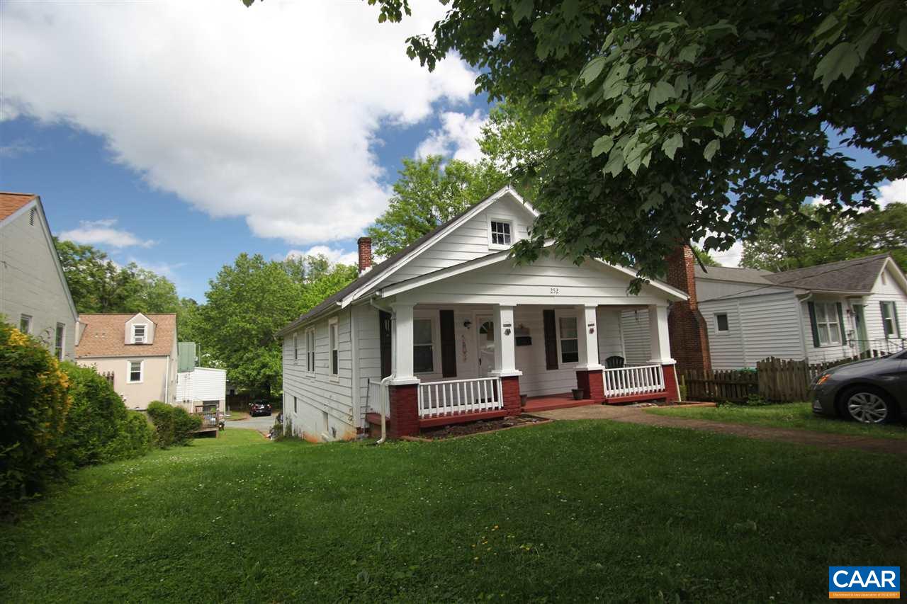 252 Shamrock Road Charlottesville, VA 22903 - Photo 15 of 18 a front view of a house with a garden and trees