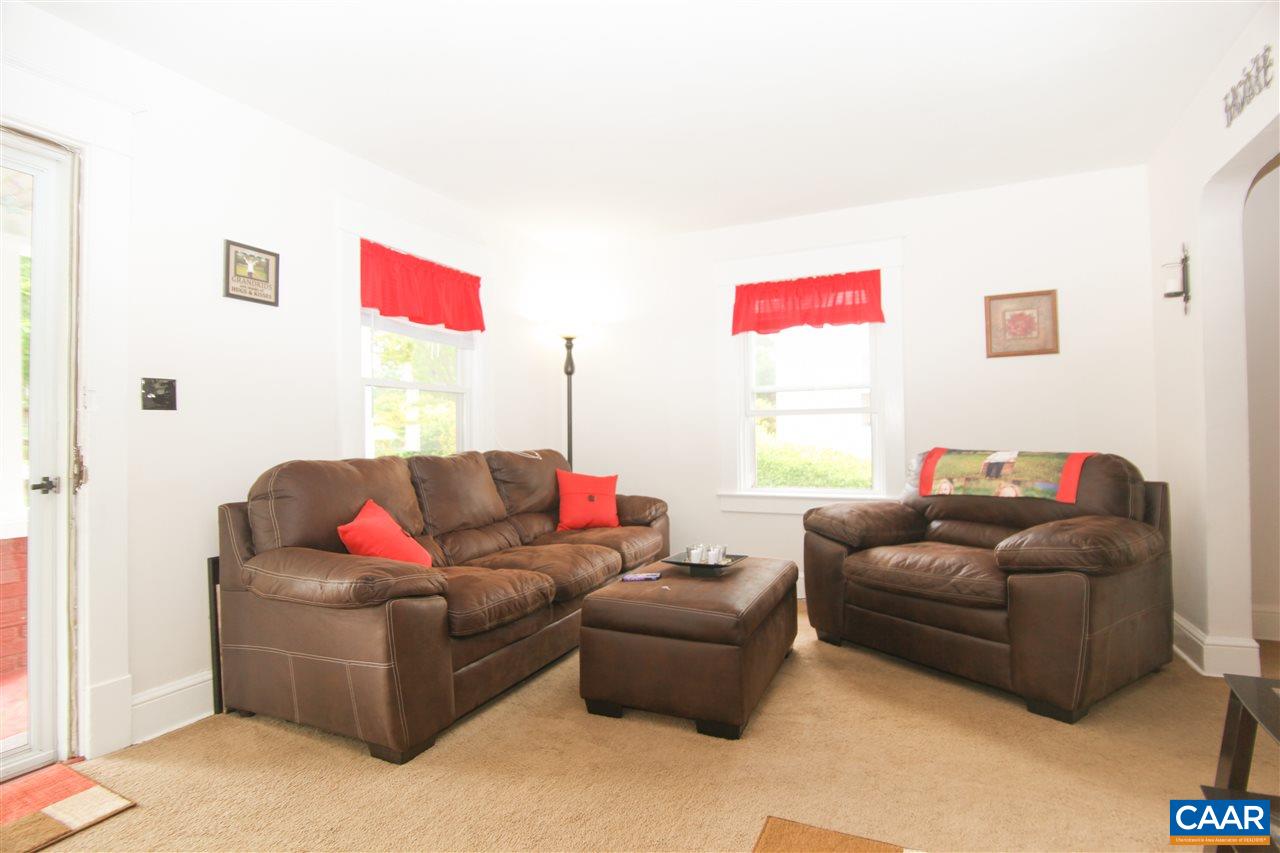 252 Shamrock Road Charlottesville, VA 22903 - Photo 7 of 18 a living room with furniture and a couch