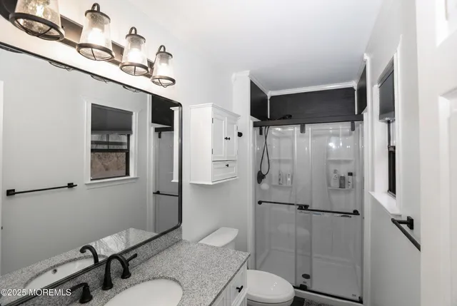 a room with a bed and a window