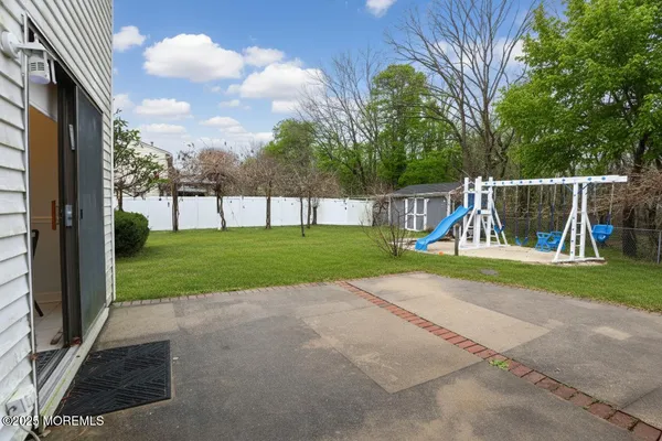 a view of a park with swings