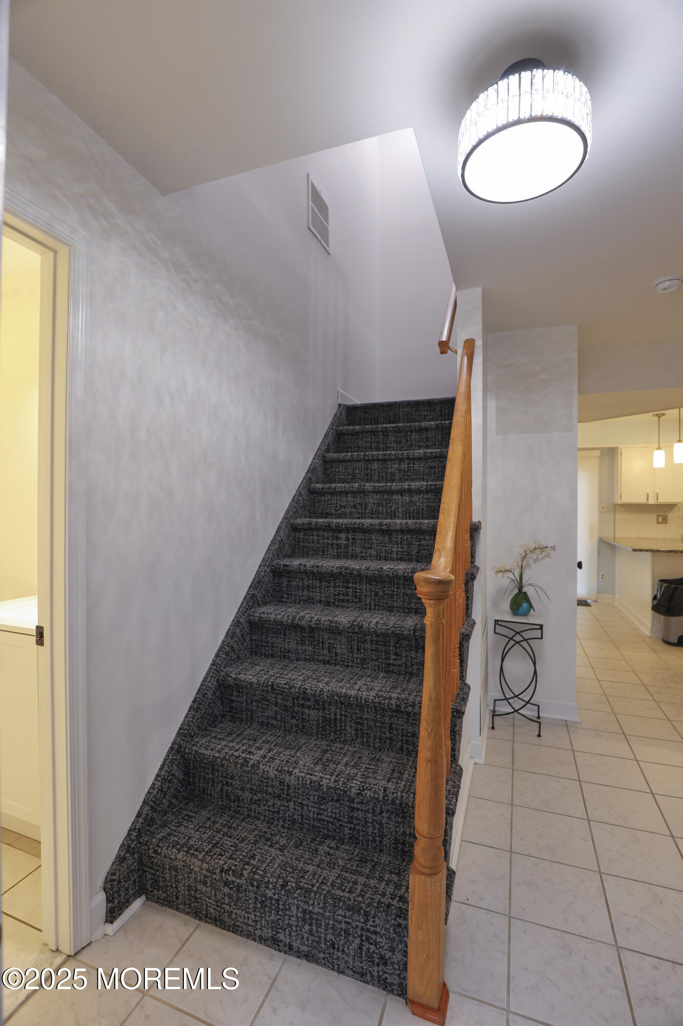 302 Princeton Drive Howell, NJ 07731 - Photo 5 of 30 a view of entryway and hall with wooden floor