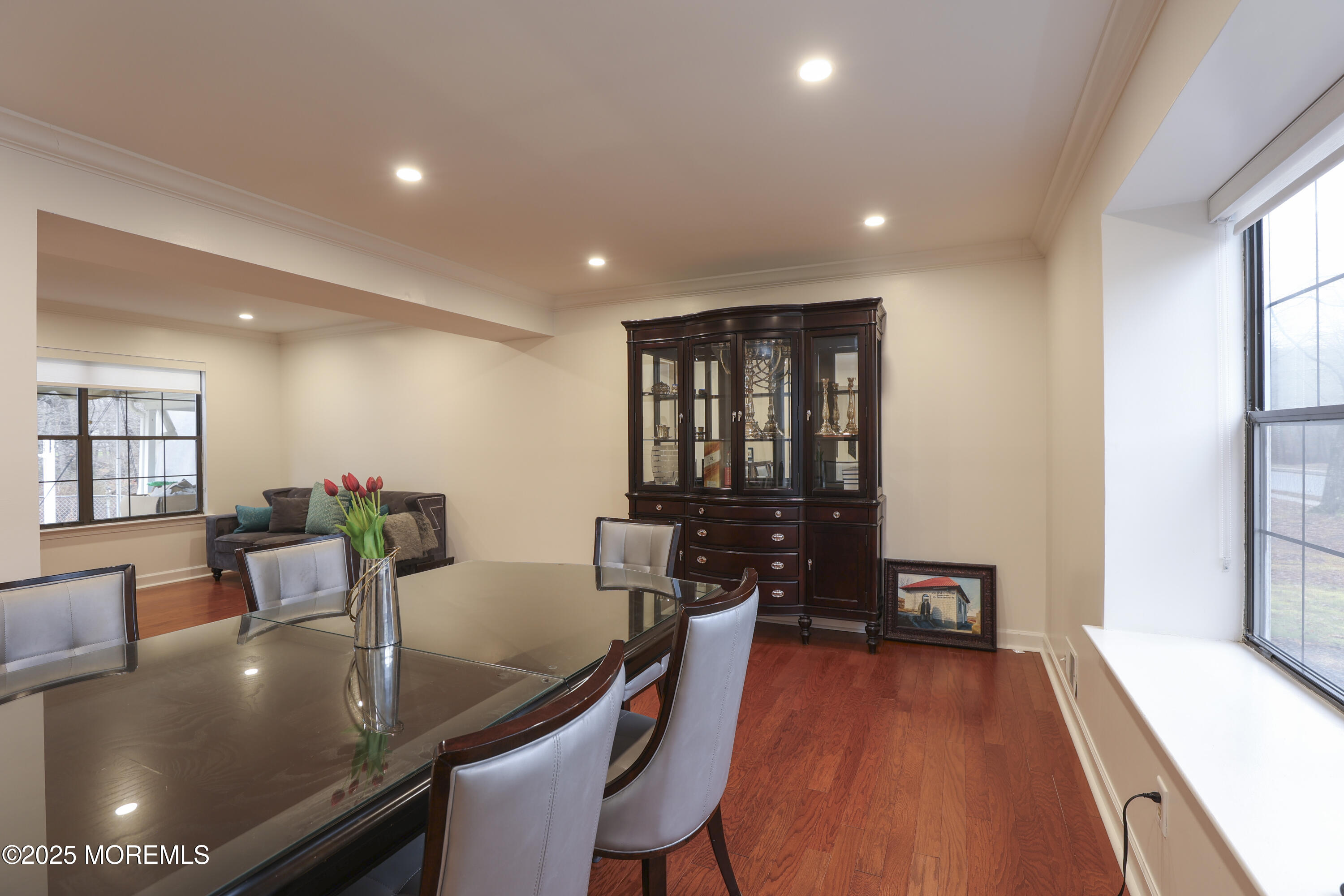 302 Princeton Drive Howell, NJ 07731 - Photo 7 of 30 a view of a dining room with furniture window and wooden floor