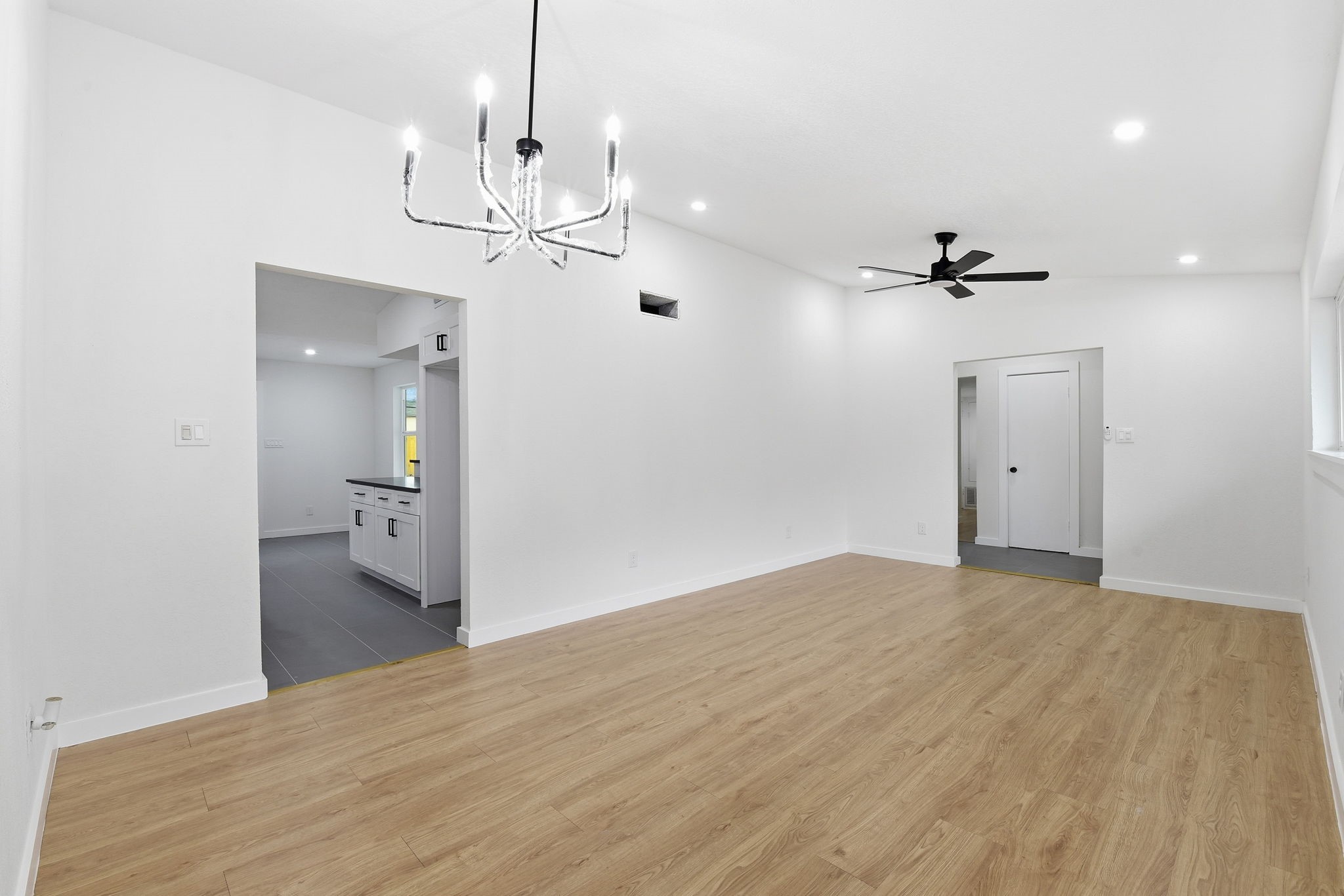 12319 Renwick Houston, TX 77035 - Photo 15 of 50 a view of empty room with wooden floor and ceiling fan