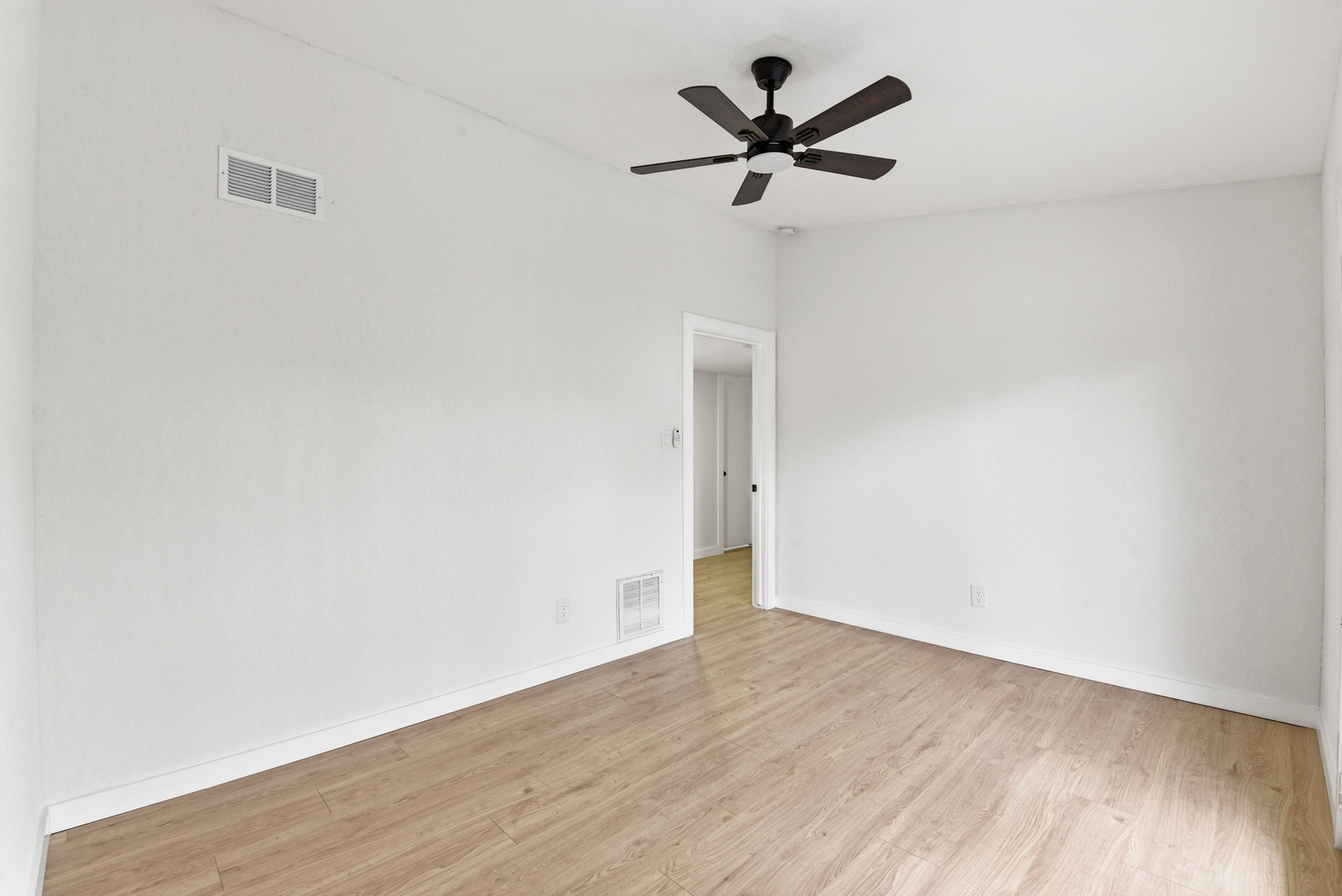 12319 Renwick Houston, TX 77035 - Photo 29 of 50 a view of a big room with wooden floor