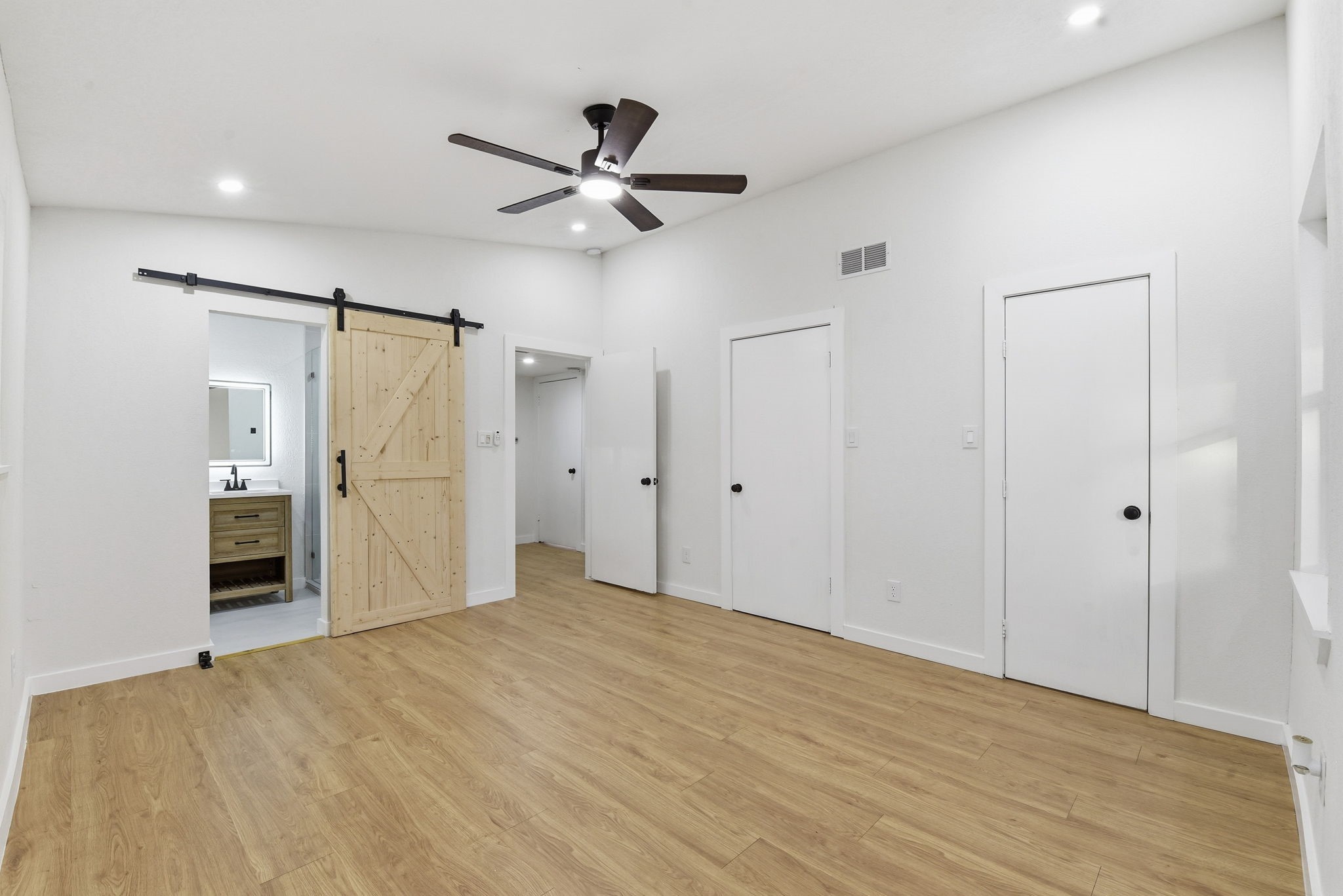 12319 Renwick Houston, TX 77035 - Photo 32 of 50 a view of empty room with wooden floor and window